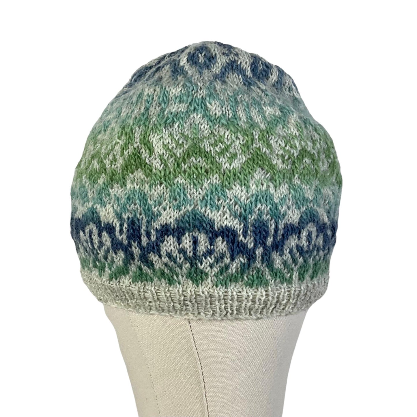 Floral Fairisle hand knitted hat in variegated yarn