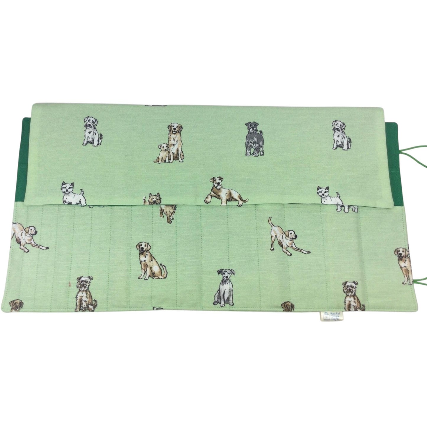 Double pointed knitting needle case with dogs