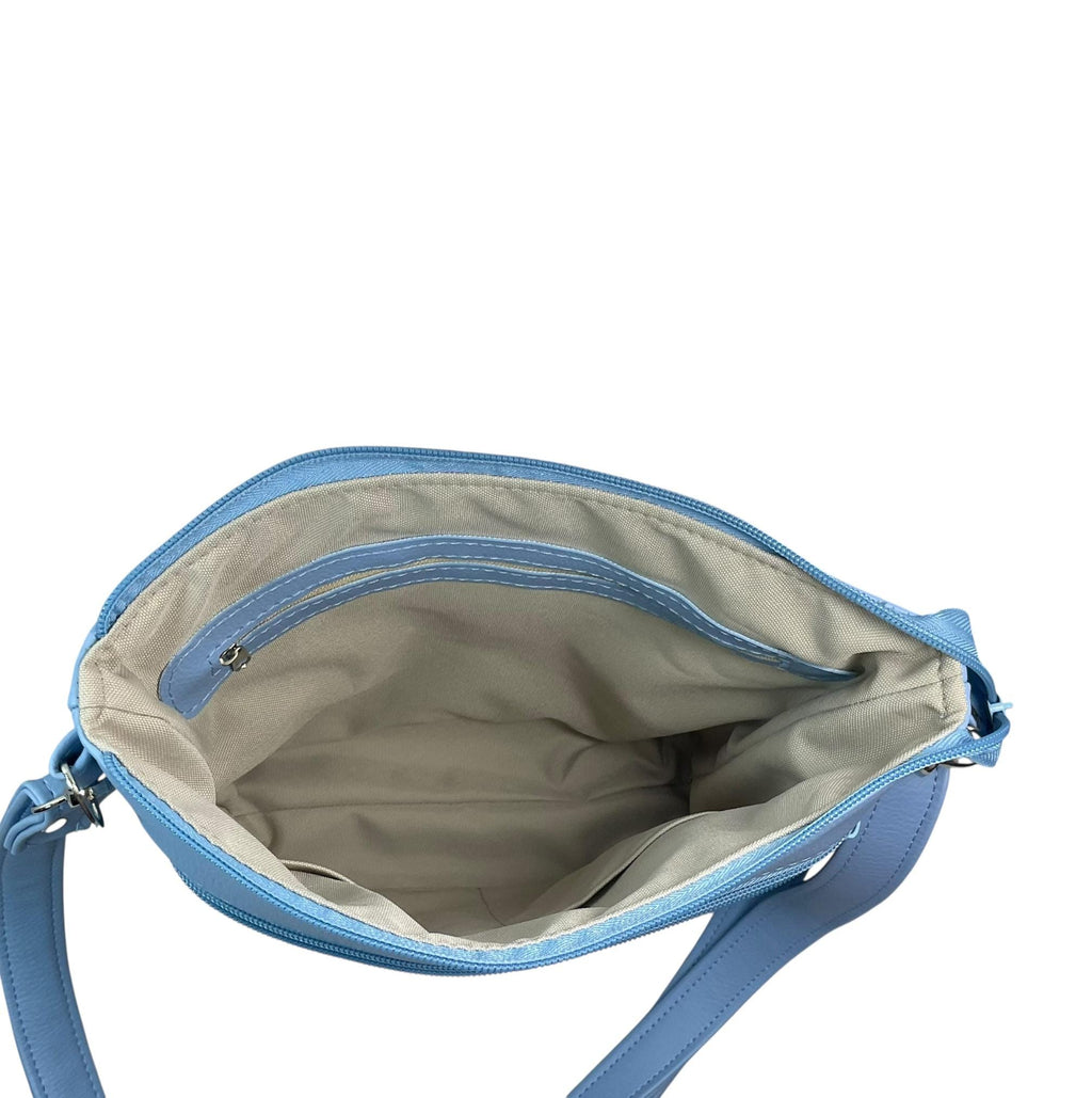Handbag in faux Leather and floral wisteria print  fabric, medium sized zip top shoulder crossbody