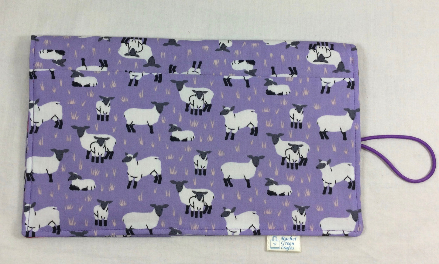Interchangeable knitting needle case with purple sheep
