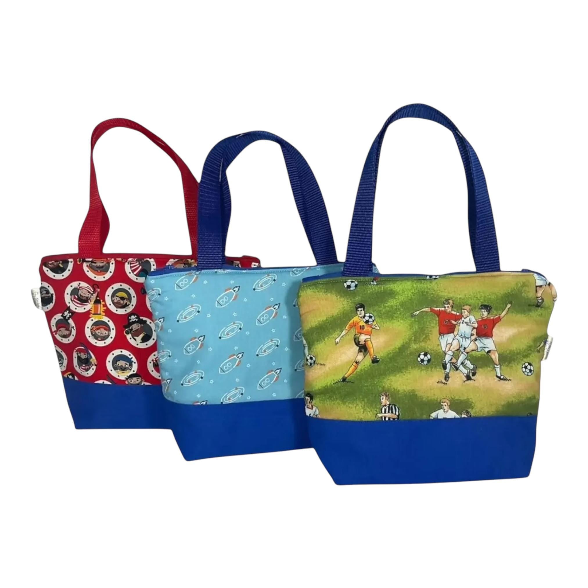 Wash bag for children with football or rockets or a pirate theme, boys travel toiletries bag with wipe clean lining and handles