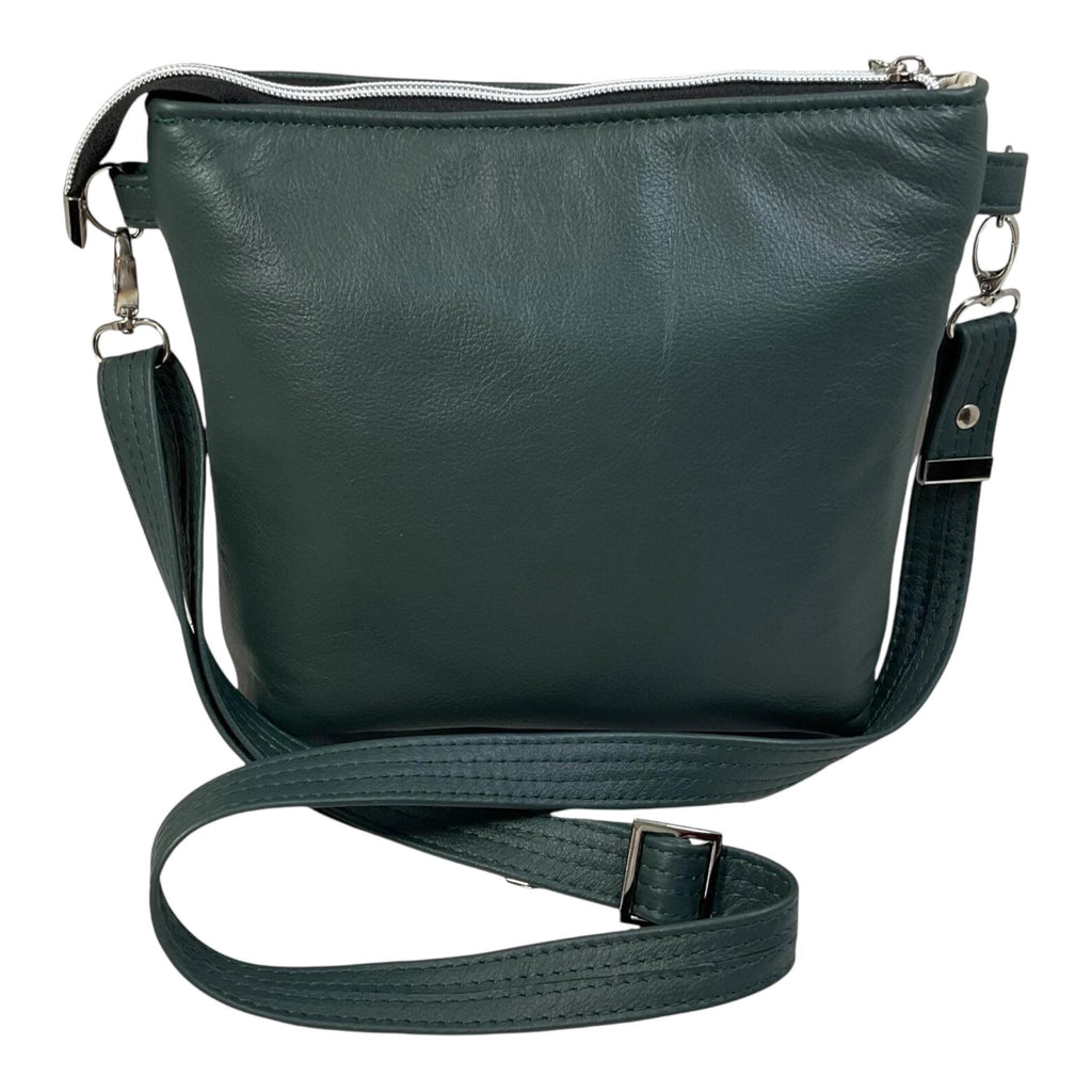 Handbag in genuine soft Cows Leather and water resistant canvas medium sized zip top