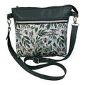 Handbag in genuine soft Cows Leather and water resistant canvas medium sized zip top