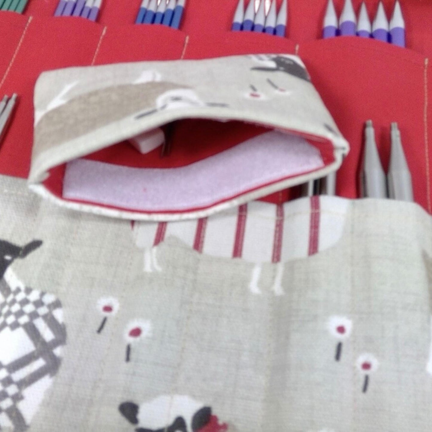interchangeable and double pointed knitting needle case with red sheep