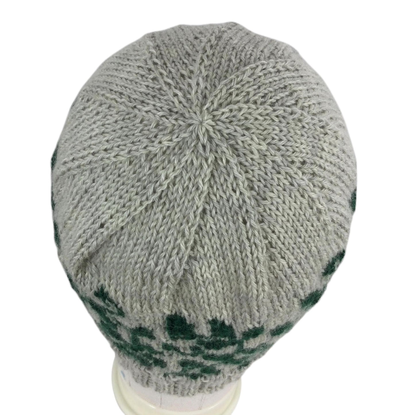 hand knit hat with green and grey floral leaf motif