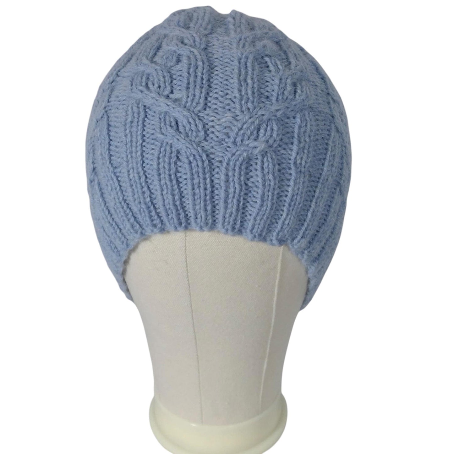 hand knitted cable hat in soft blue