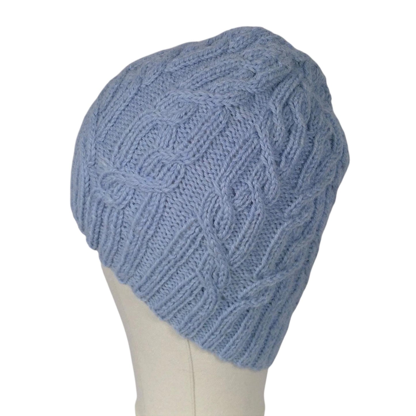 hand knitted cable hat in soft blue