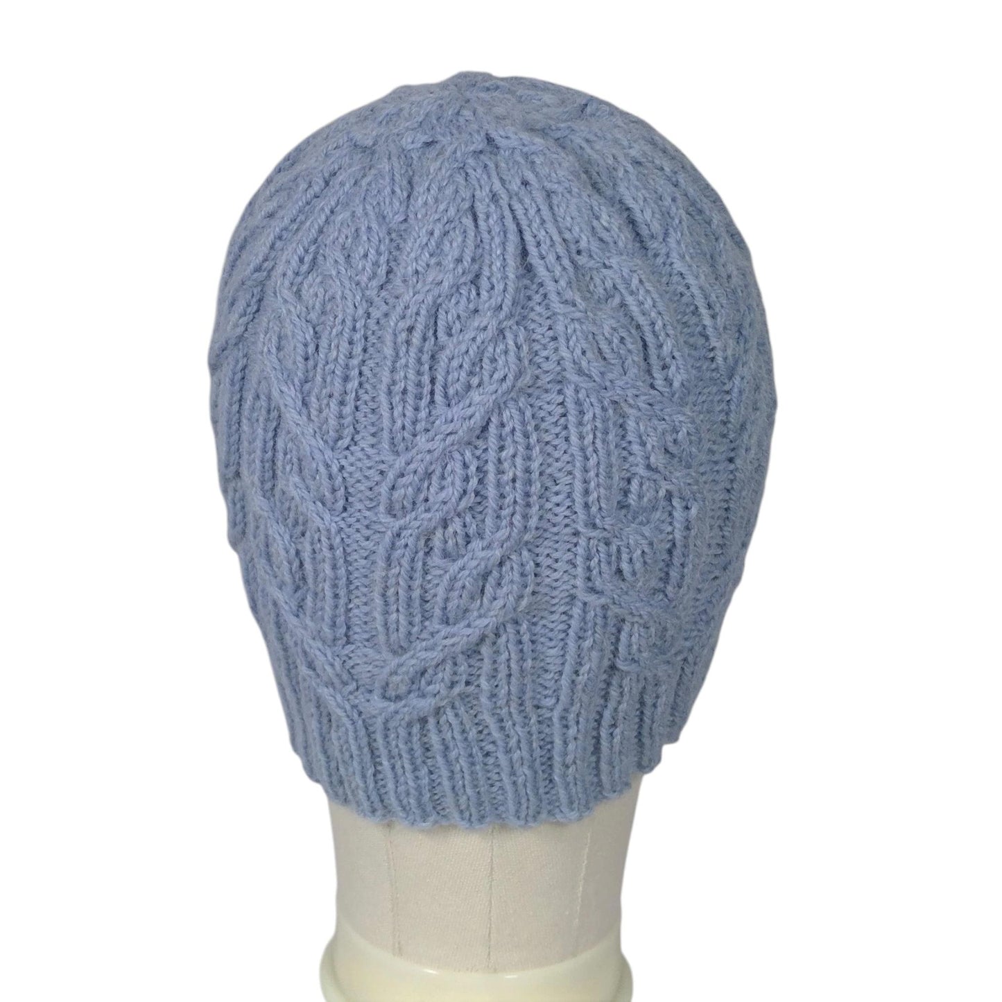hand knitted cable hat in soft blue