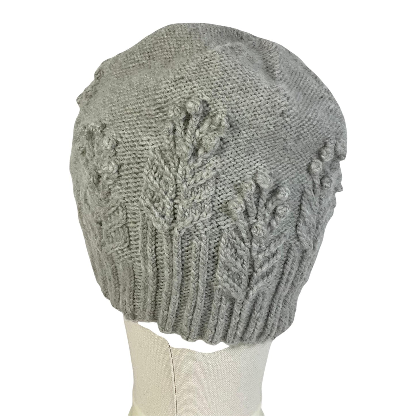 hand knitted cable and bobble hat in silver grey