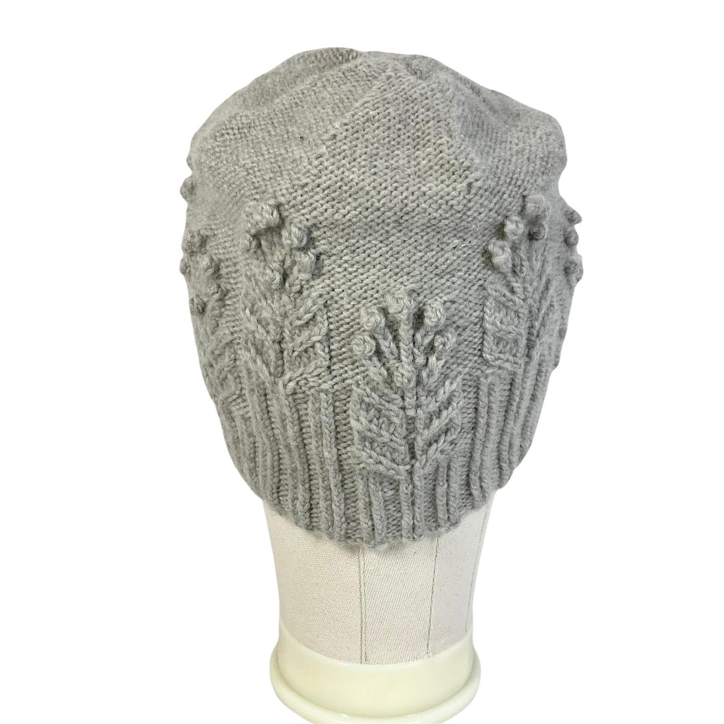 hand knitted cable and bobble hat in silver grey