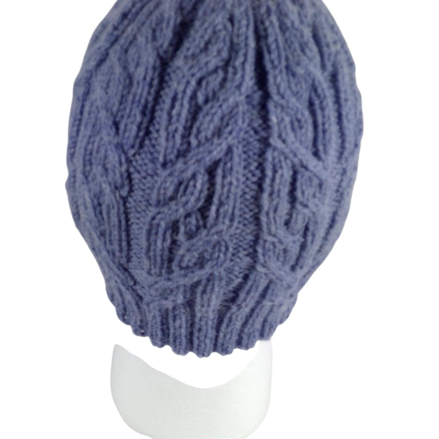 hand knitted cable hat in mid blue