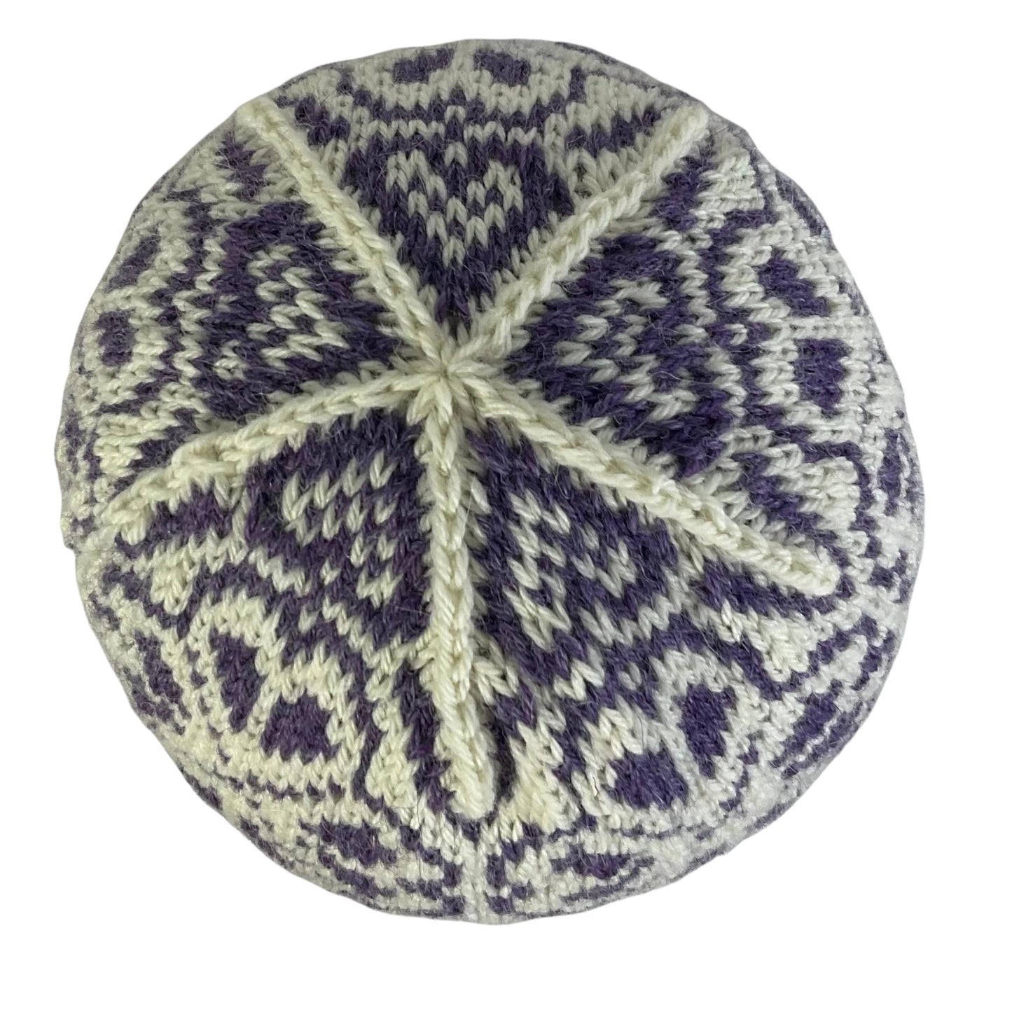 hand knit hat with white and purple floral motif