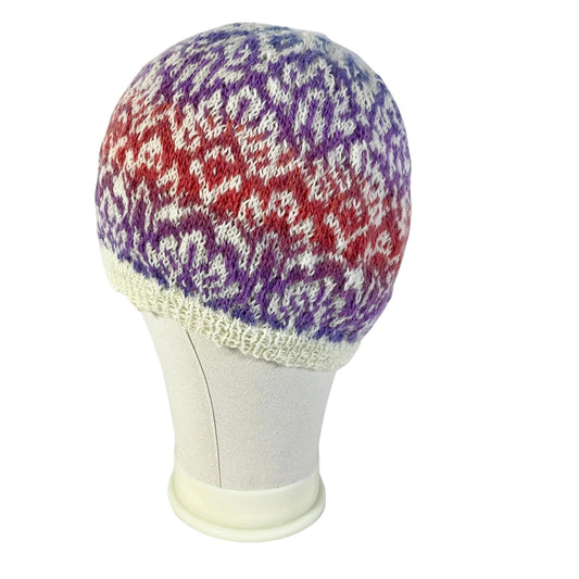 Floral Fairisle hand knitted hat in variegated yarn