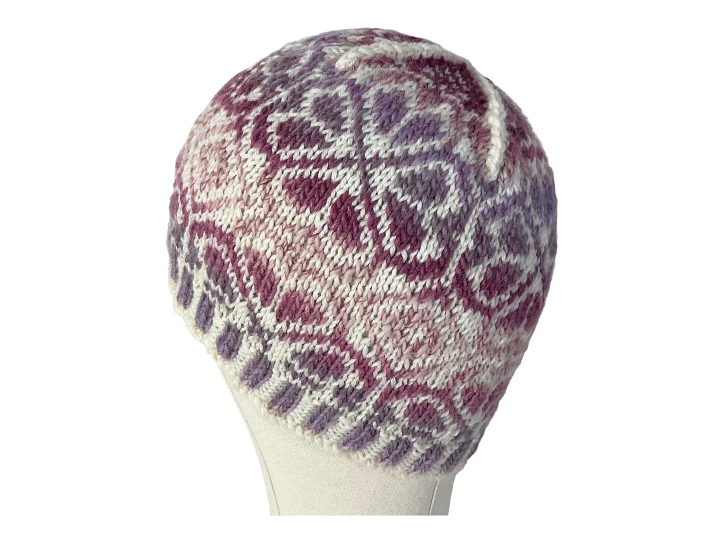 hand knit hat with variegated pink and purple floral motif