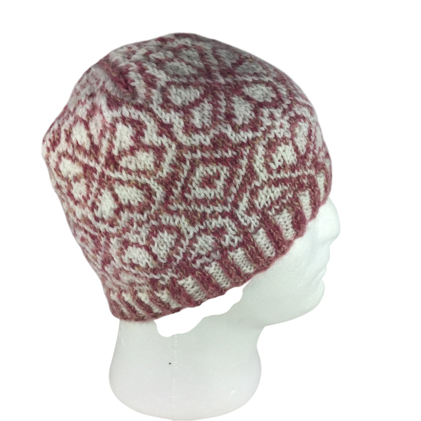 hand knit hat with wine pink and white floral motif