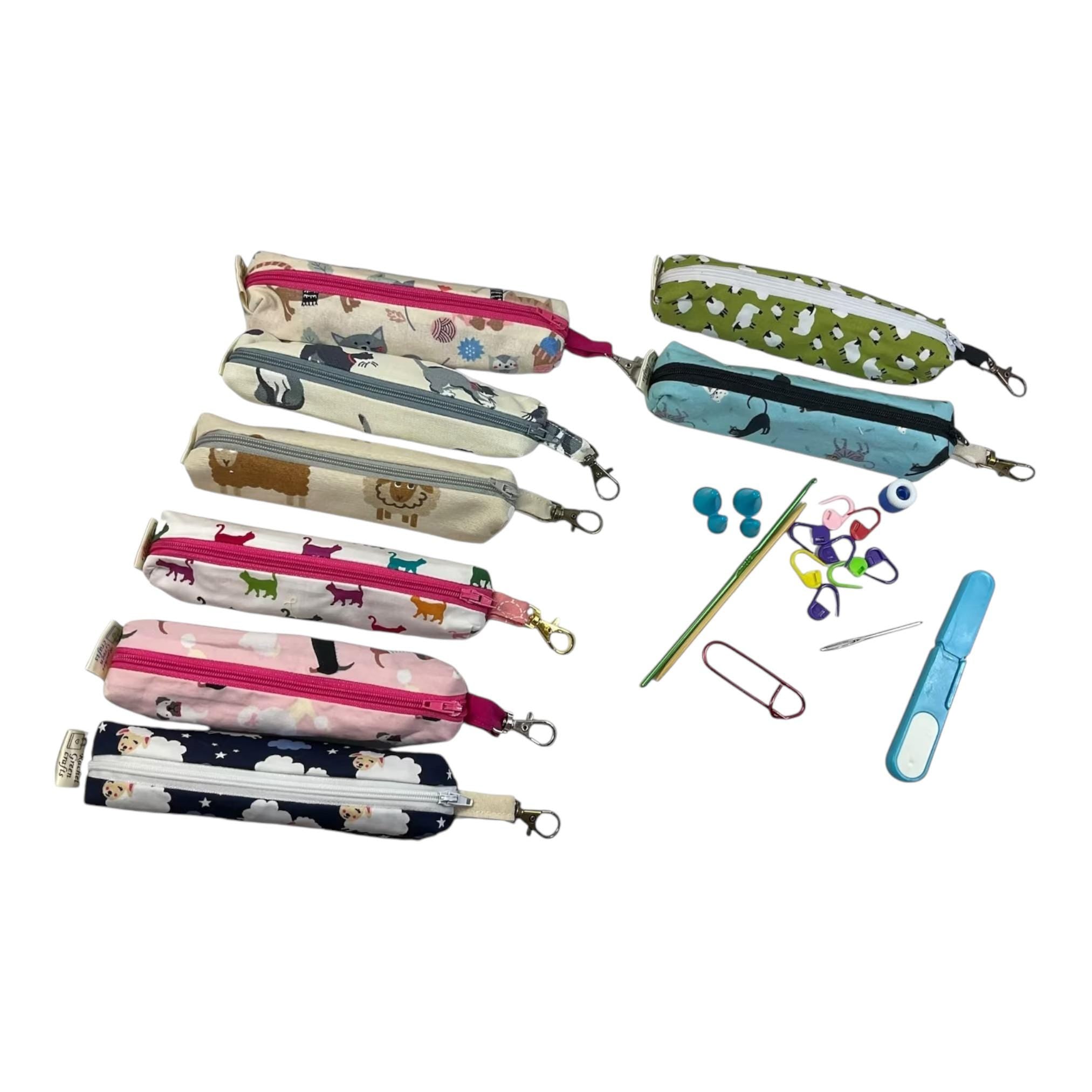 Knitting and crochet travel notions kit filled with accessories,  handy clip on knit bag travel kit, stitch markers, travel scissors,