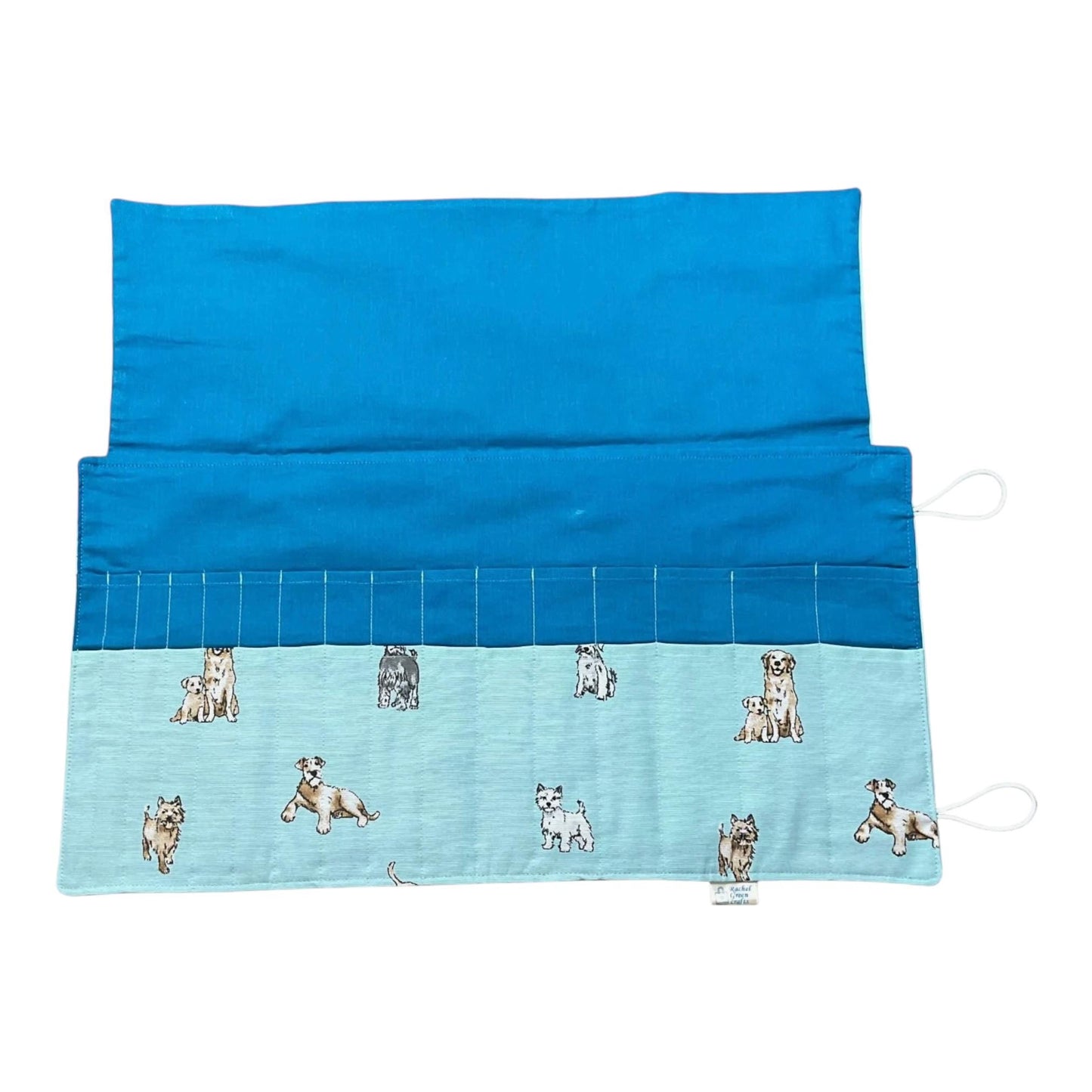Double pointed knitting needle case with dogs