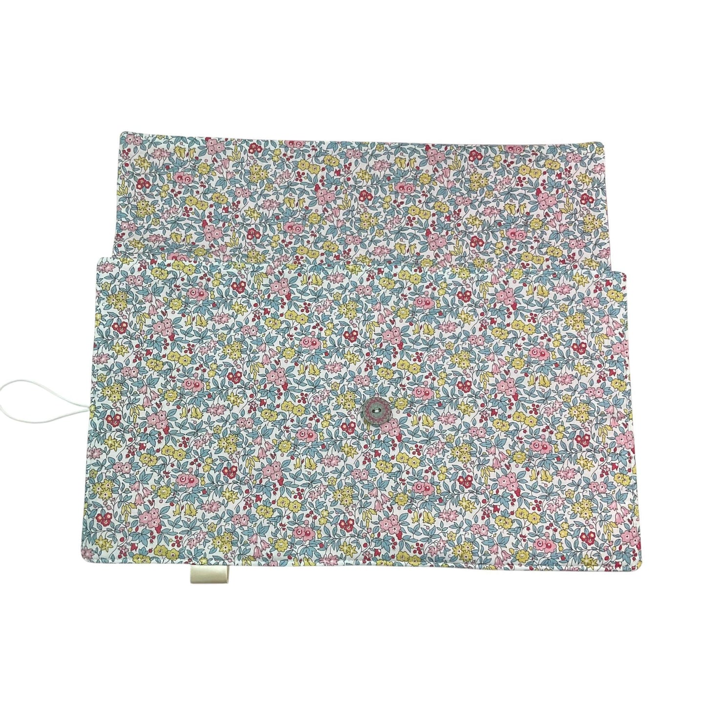 Circular knitting needle case made from Liberty floral fabric