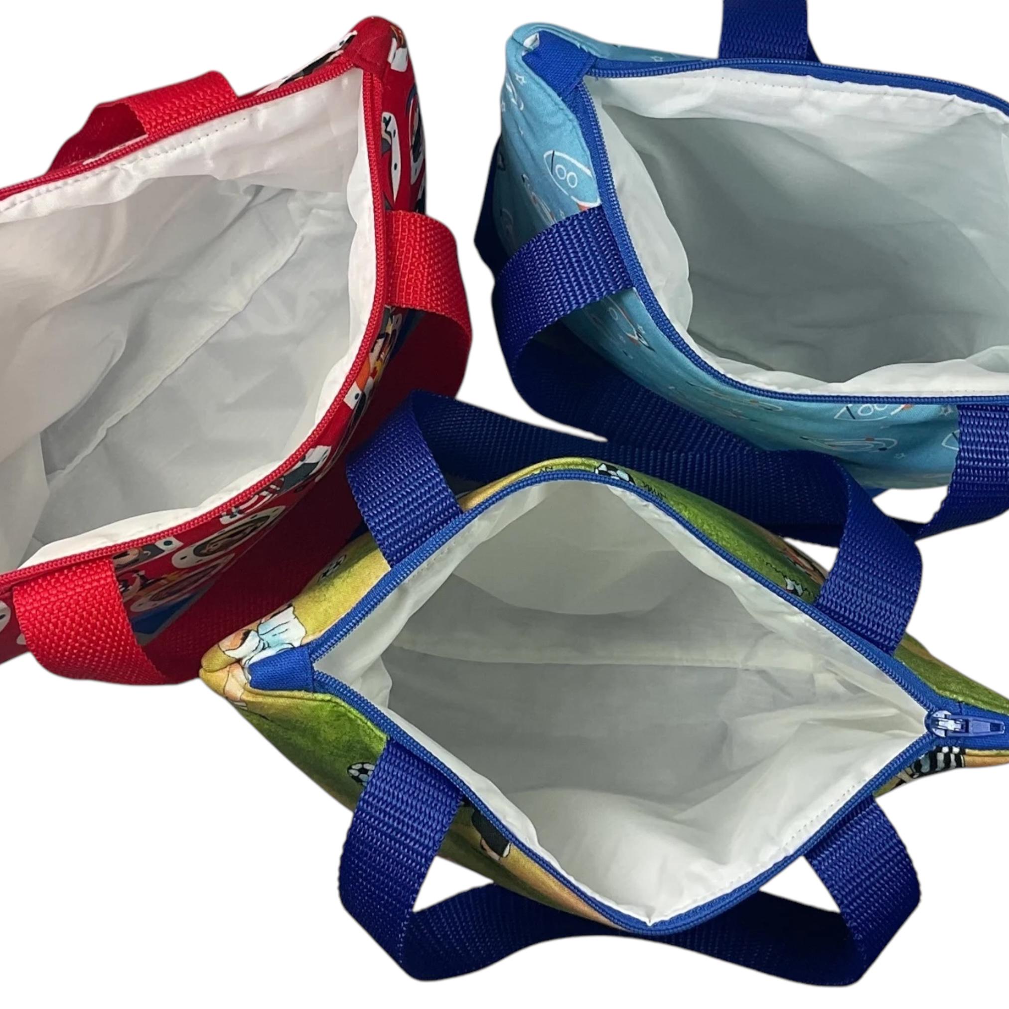 Wash bag for children with football or rockets or a pirate theme, boys travel toiletries bag with wipe clean lining and handles
