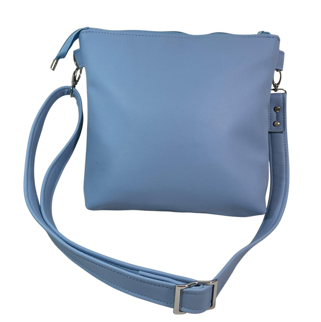 Handbag in faux Leather and floral wisteria print  fabric, medium sized zip top shoulder crossbody