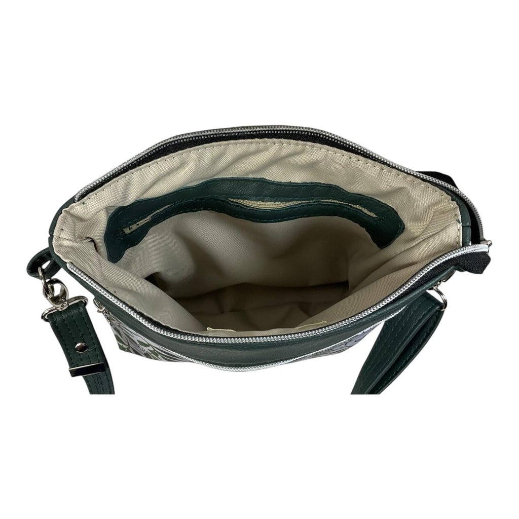 Handbag in genuine soft Cows Leather and water resistant canvas medium sized zip top