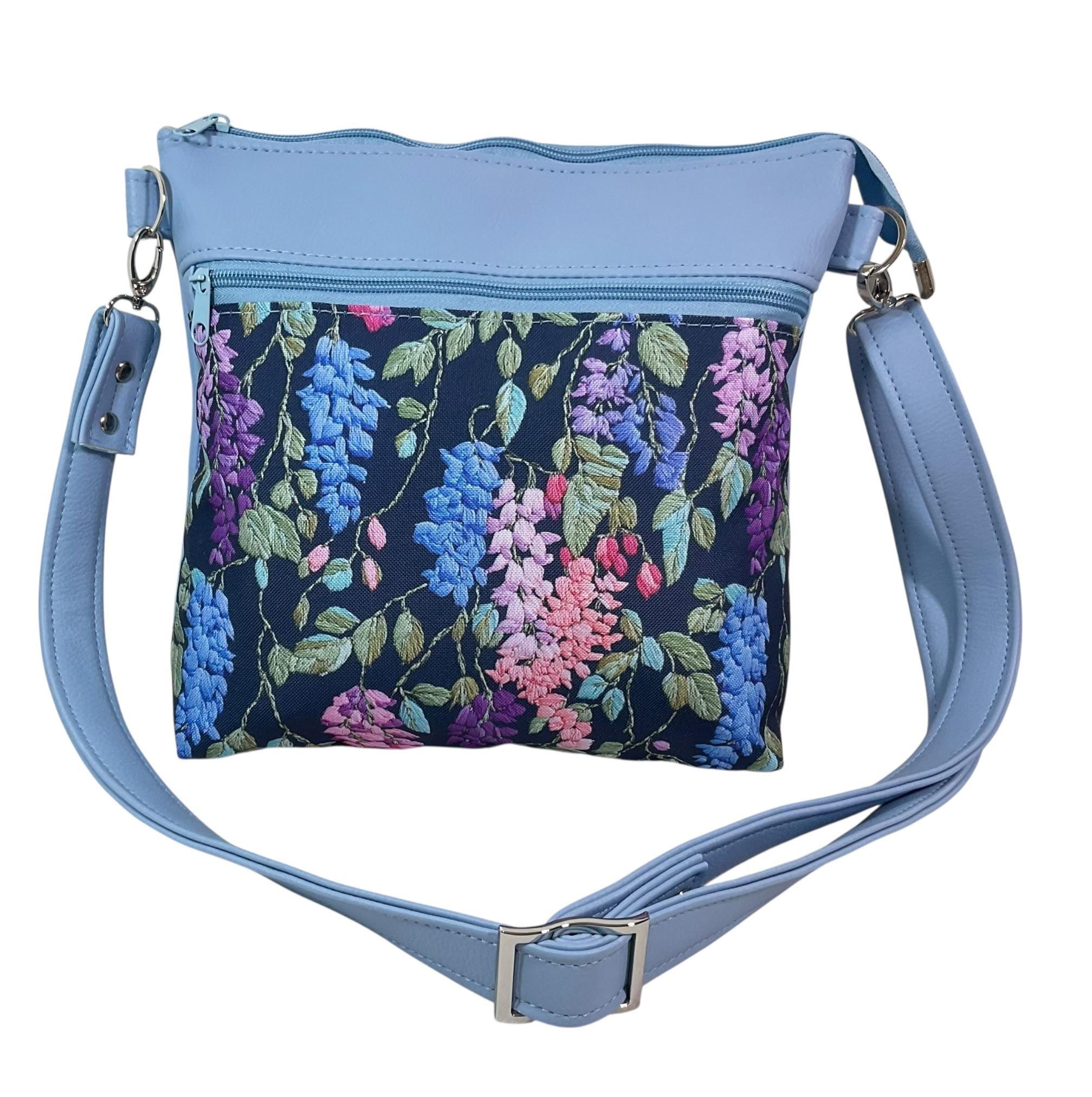 Handbag in faux Leather and floral wisteria print  fabric, medium sized zip top shoulder crossbody