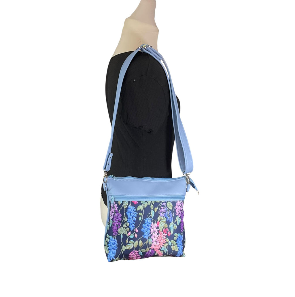 Handbag in faux Leather and floral wisteria print  fabric, medium sized zip top shoulder crossbody