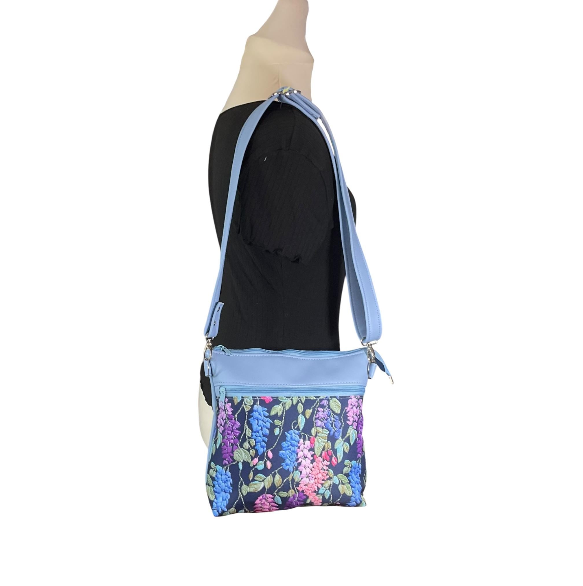 Handbag in faux Leather and floral wisteria print  fabric, medium sized zip top shoulder crossbody